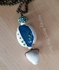 Beach pendant in blue and white lampwork