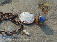 Mother of Pearl Leaf and Acorn necklace features copper topped lampwork