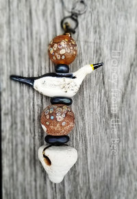 By the Sea Artisan necklace features sea pottery and lampwork