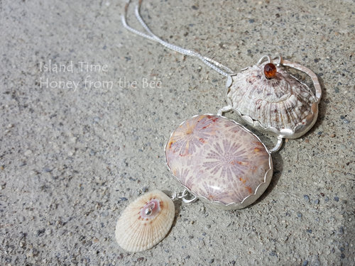Shell and Coral Agate pendant in shades of lavender, cream and amber