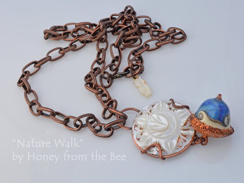 Blue and white pendant with nature as inspiration