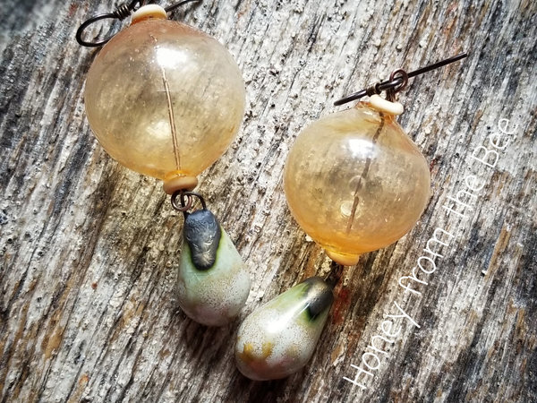Gold and light green earrings