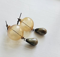 Statement boho earrings in yellow and pale green