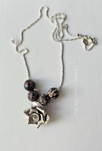 Silver Rose necklace with faceted gemstones