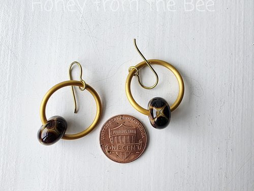 Artisan earrings in brown and gold