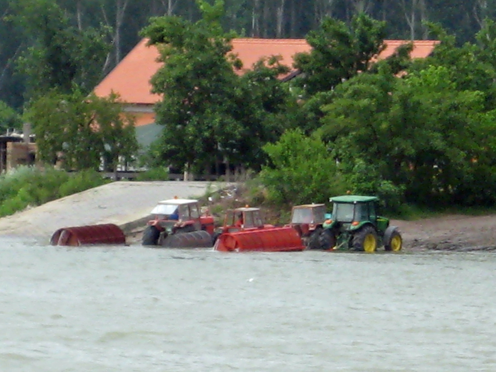 Rolling Barrels and Tractor on Danube