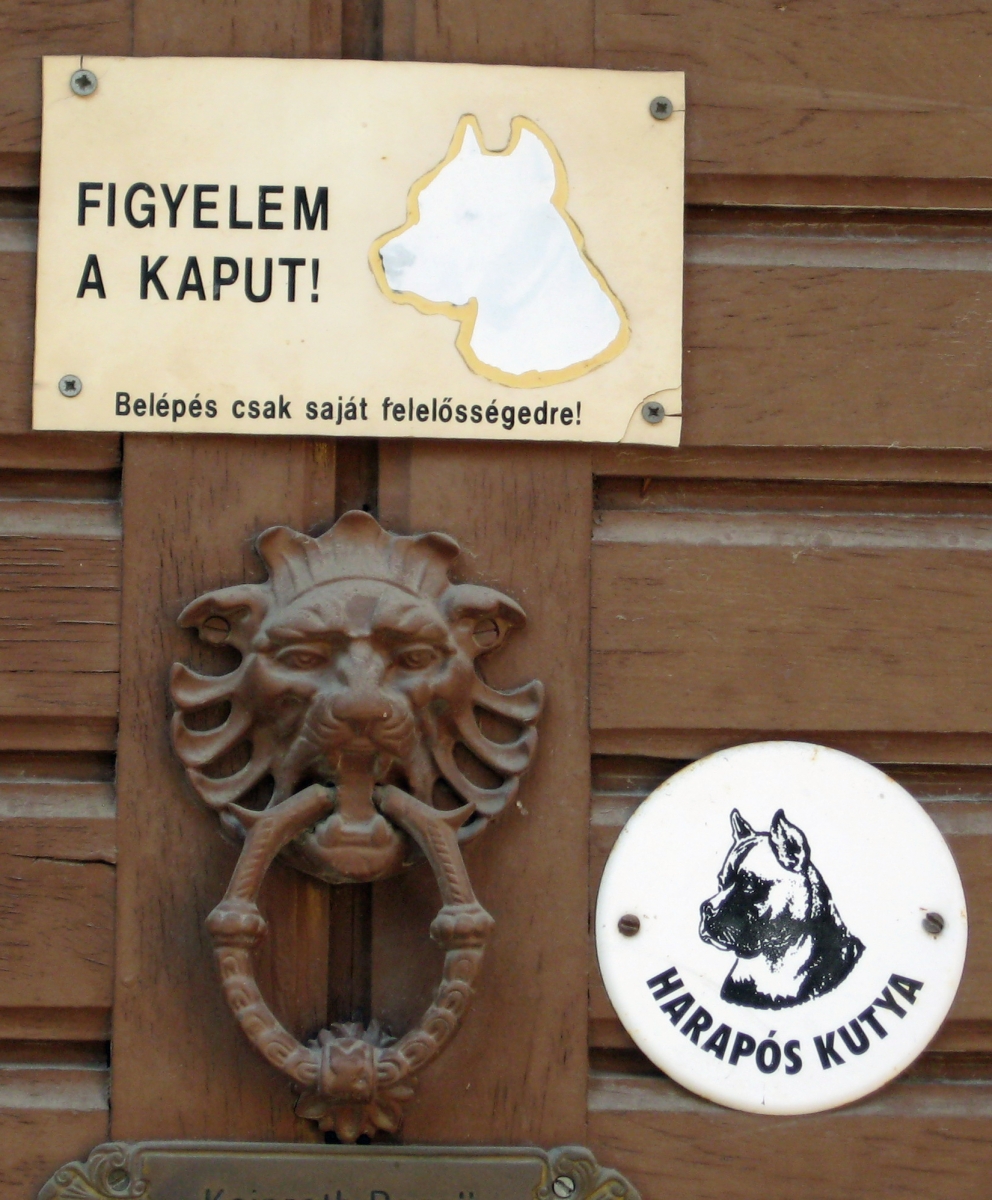 Biting dog sign, Mohacs, Hungary