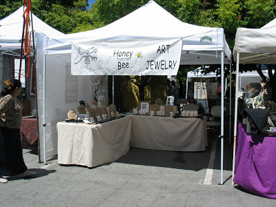 Honey from the Bee Artisan Jewelry show tent.