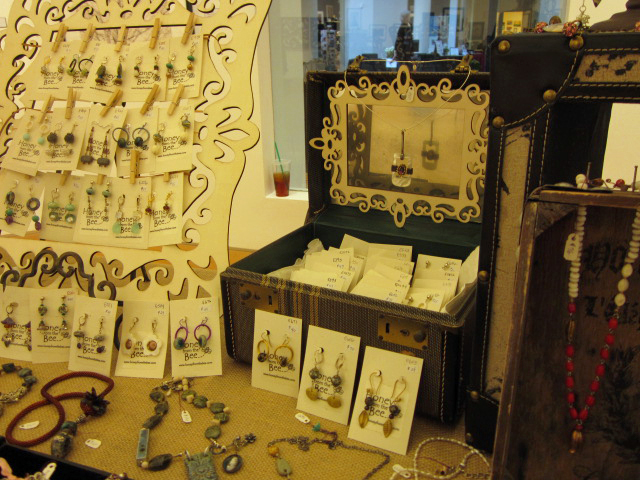 Honey from the Bee jewelry Booth display using old suitcase