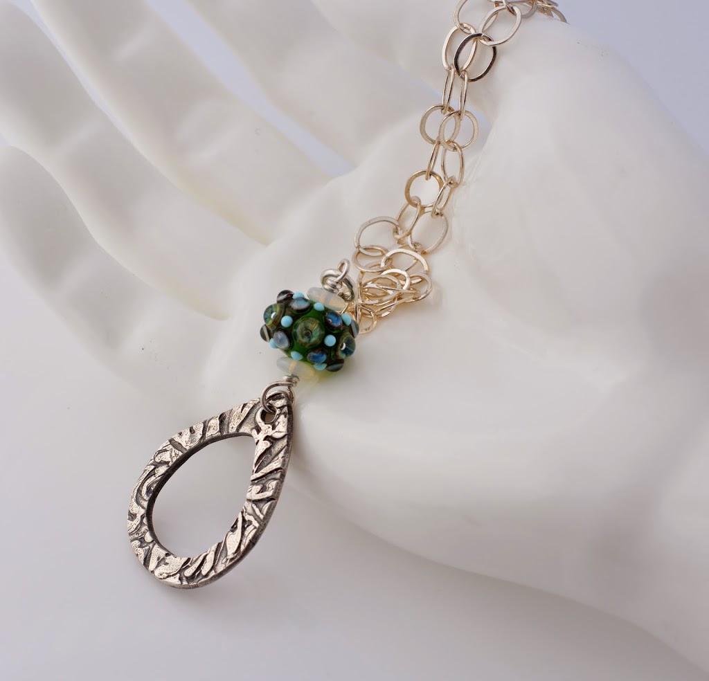 Silver and Green Lampwork pendant