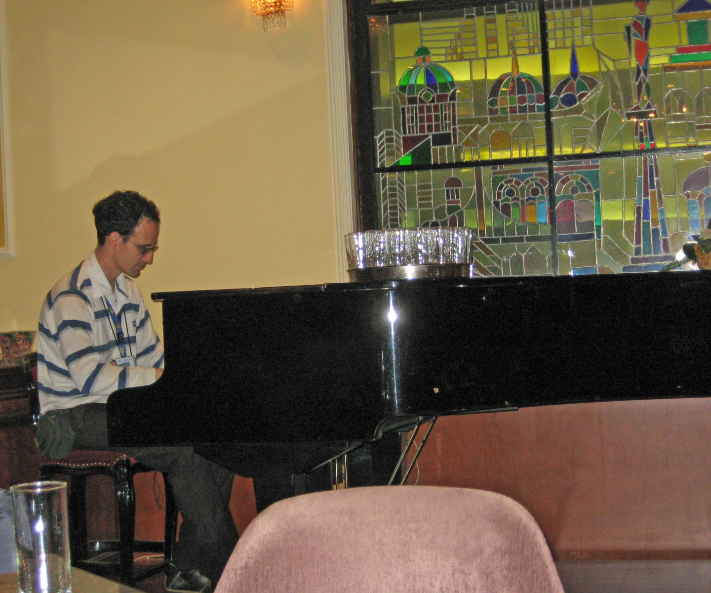 Piano player inside The Majestic, Belgrade, Serbia