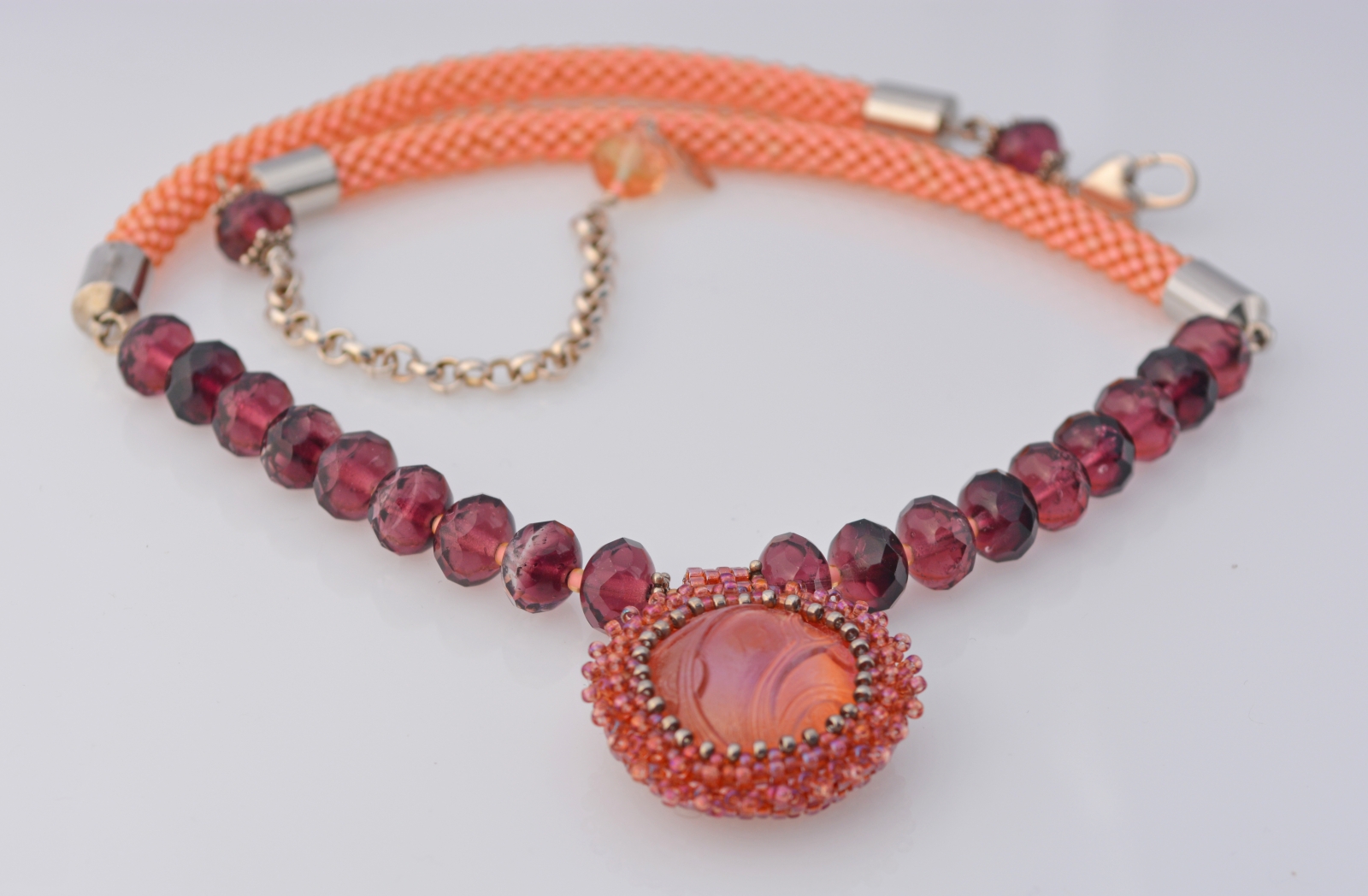Artisan necklace in peach