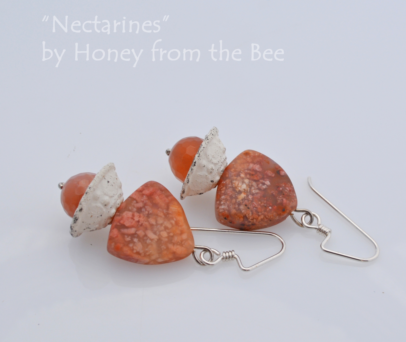 Artisan earrings in living coral