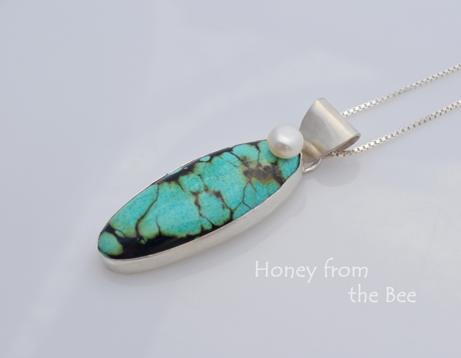 White Pearl and Turquoise pendant set in sterling silver
