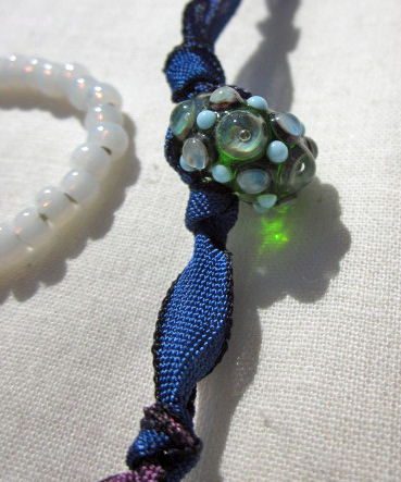 Close up of art bead used in Artisan Statement Necklace