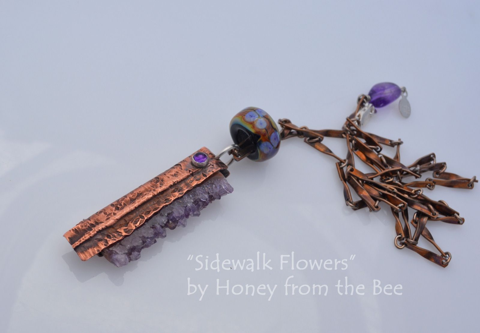 Amethyst and foldformed copper pendant by Honey from the Bee