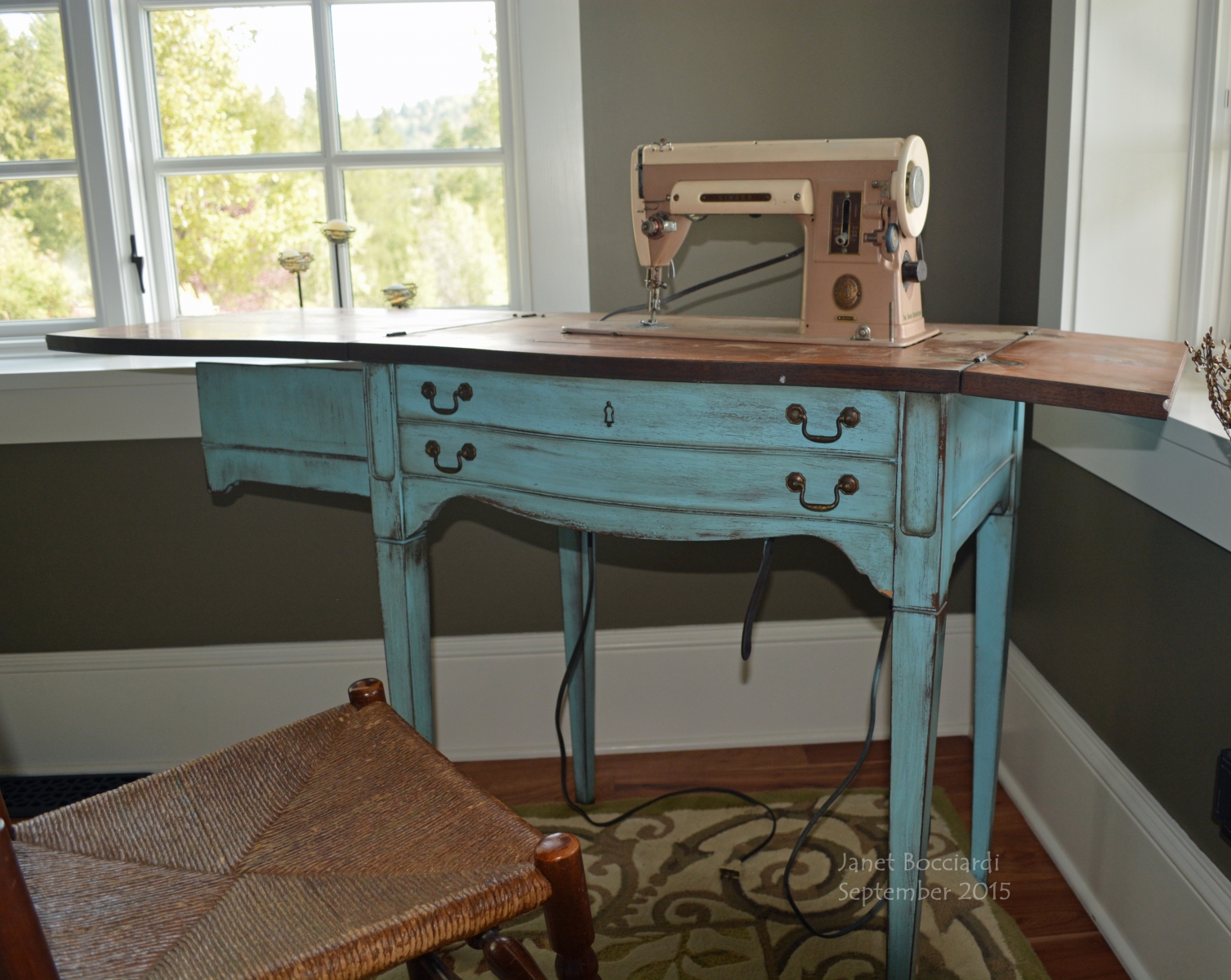 Singer Sewing Machine model 301A in cabinet
