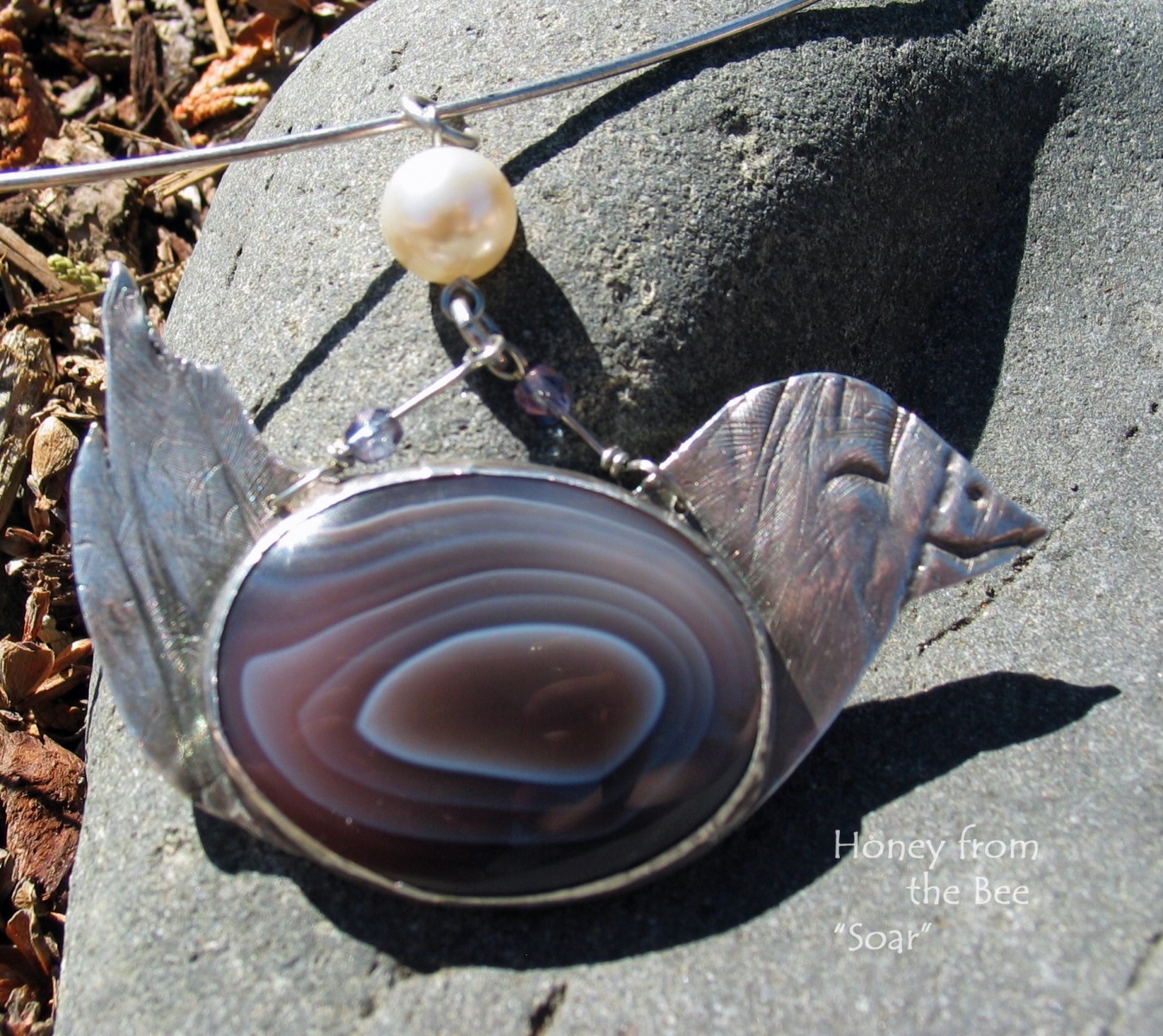 Botswana Agate and sterling silver bird pendant by Honey from the Bee