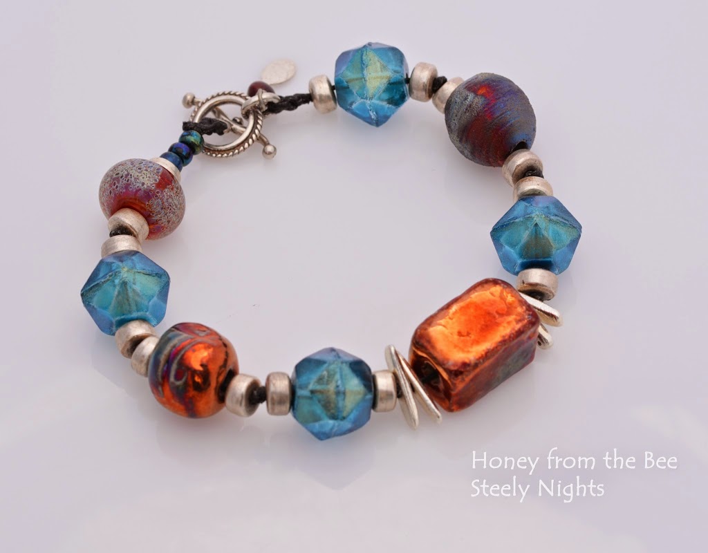 Turquoise and Rust artisan bracelet