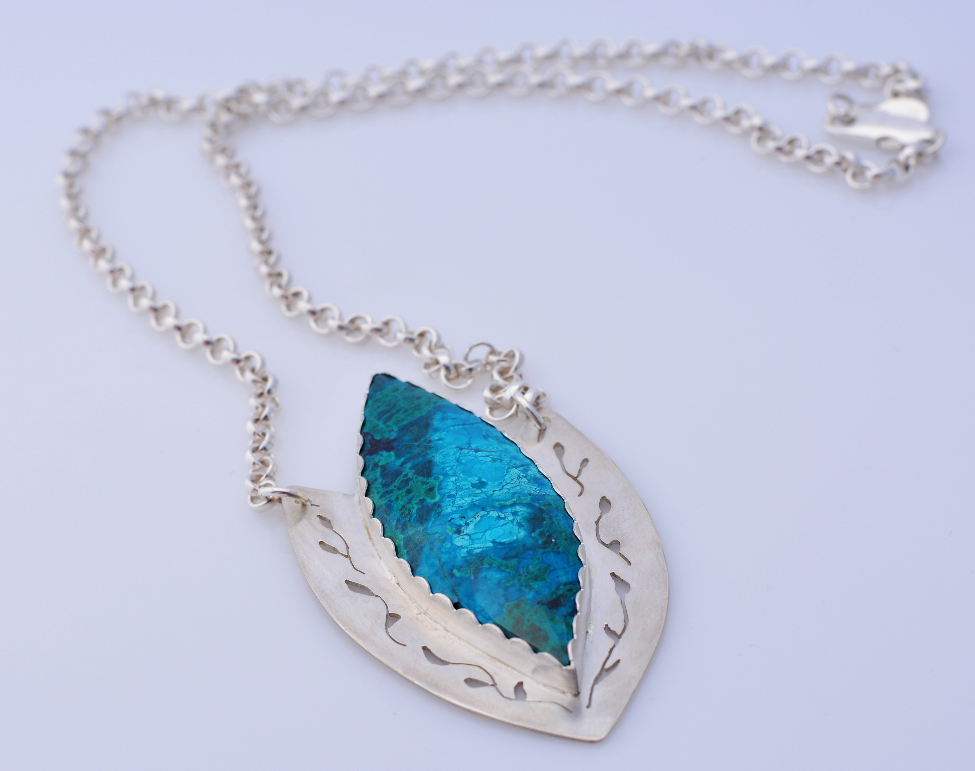 Blue Bird Mine Chrysocolla set in sterling silver pendant represents Kelp Forest in Monterey Bay