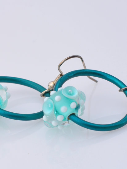Bubbly Sea earrings feature anodized aluminum and lampwork