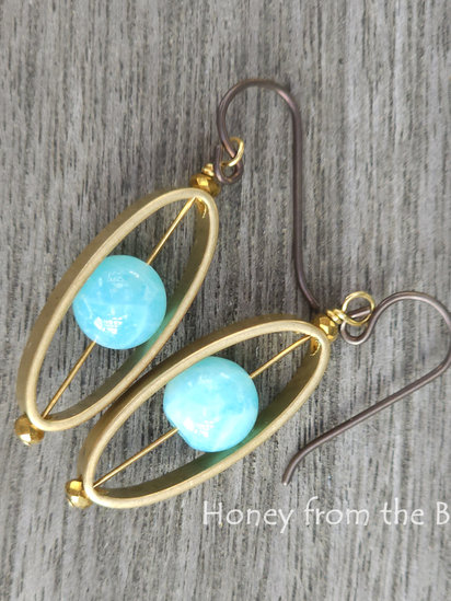 Caribbean Capture earrings features Peruvian opal and vintage brass