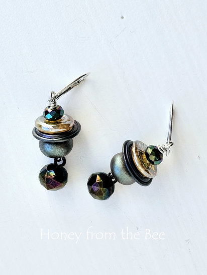 Darkest Before Dawn earrings features lampwork and antique button
