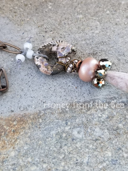 Feminine Mystique pendant features opalized ammonite, ocean jasper, lampwork