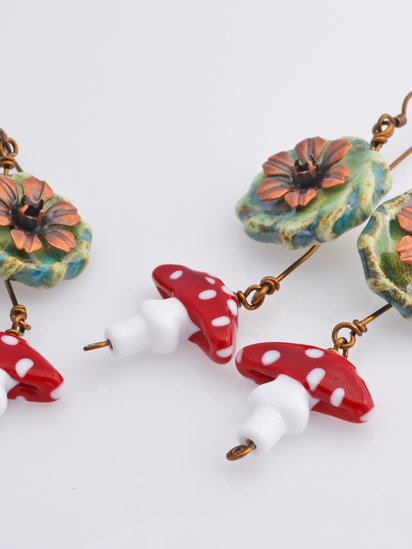 Homegrown earrings features lampwork and ceramic