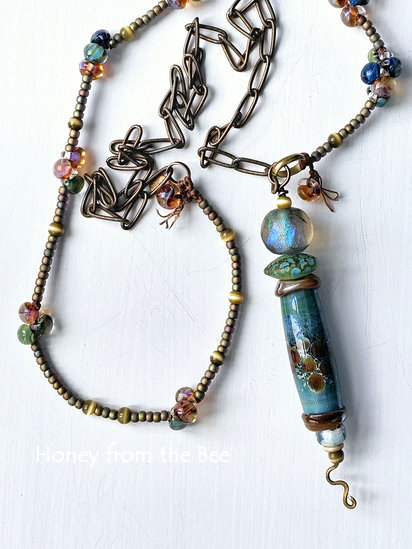 Life's the Bubbles necklace features lampwork