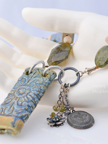 Mediterranean Tapestry Necklace features ceramic, green garnet, lampwork, antique cameo, crystals