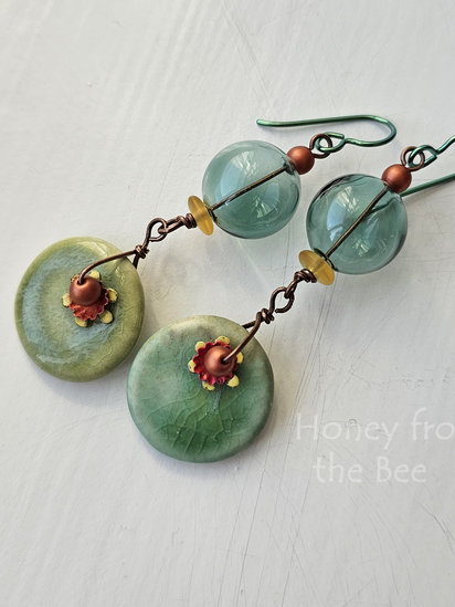 Second Summer earrings features ceramic, hollow lampwork