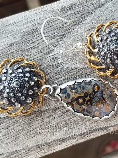 Stardust earrings features Oolitic marble and antique buttons