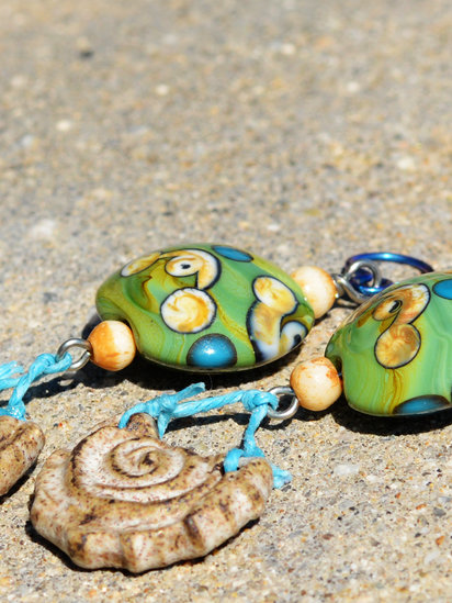 Washed Ashore earrings feature lampwork and ceramic drops