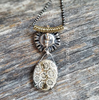 antique button necklace show open back of cabochon