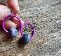 Purple hoop earrings