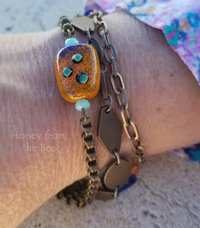 blue and orange chain bracelet