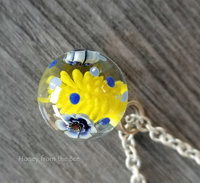Astrid Reidel lampwork necklace in blue, yellow and white