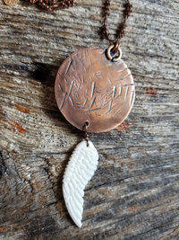 Boho style wing pendant