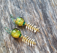 Green and gold artisan earrings