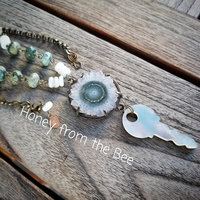 white and green boho necklace is a statement piece