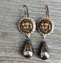 Art earrings with detailed antique pansy buttons