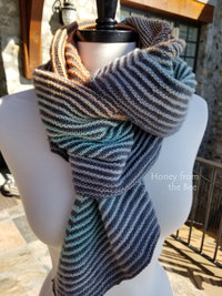 Teal and orange hand-knit shawl