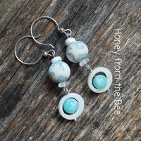 light blue and white earrings