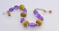 Amethyst and golden lampwork bracelet