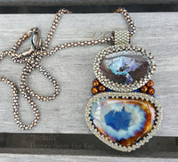 One of a Kind Artisan Pendant features boulder opal and ceramic cabochon with pearls