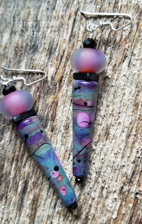 Long bold earrings