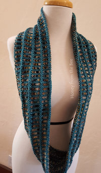 Teal, cream and brown hand-knit scarf