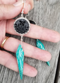 Black and green earrings