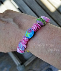 pink and blue bracelet